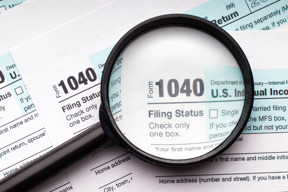 1040,Tax,Form,And,Magnifying,Glass.,Tax,Audit,And,Analytics,