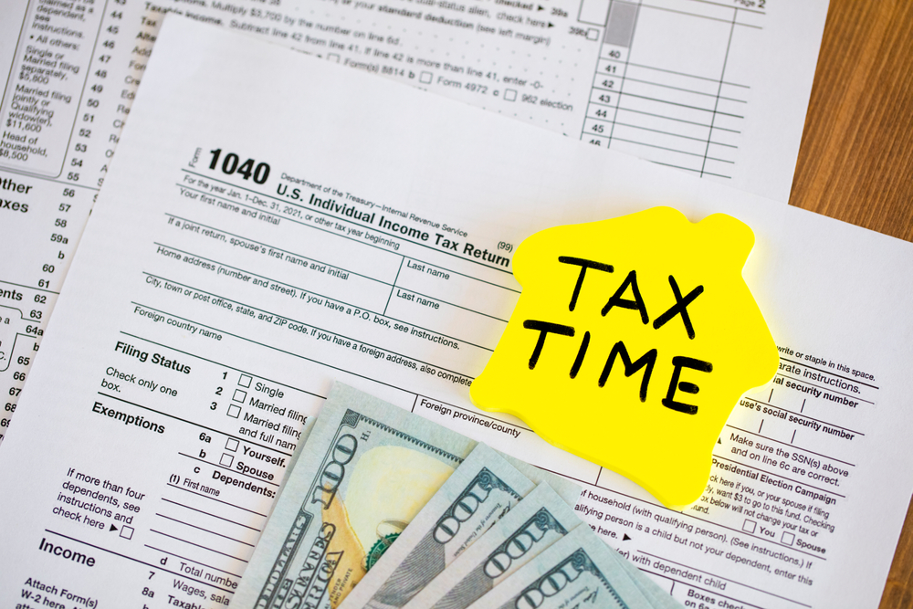 Tax,Time,Concepts.,1040,Tax,Form,On,Wooden,Table,With